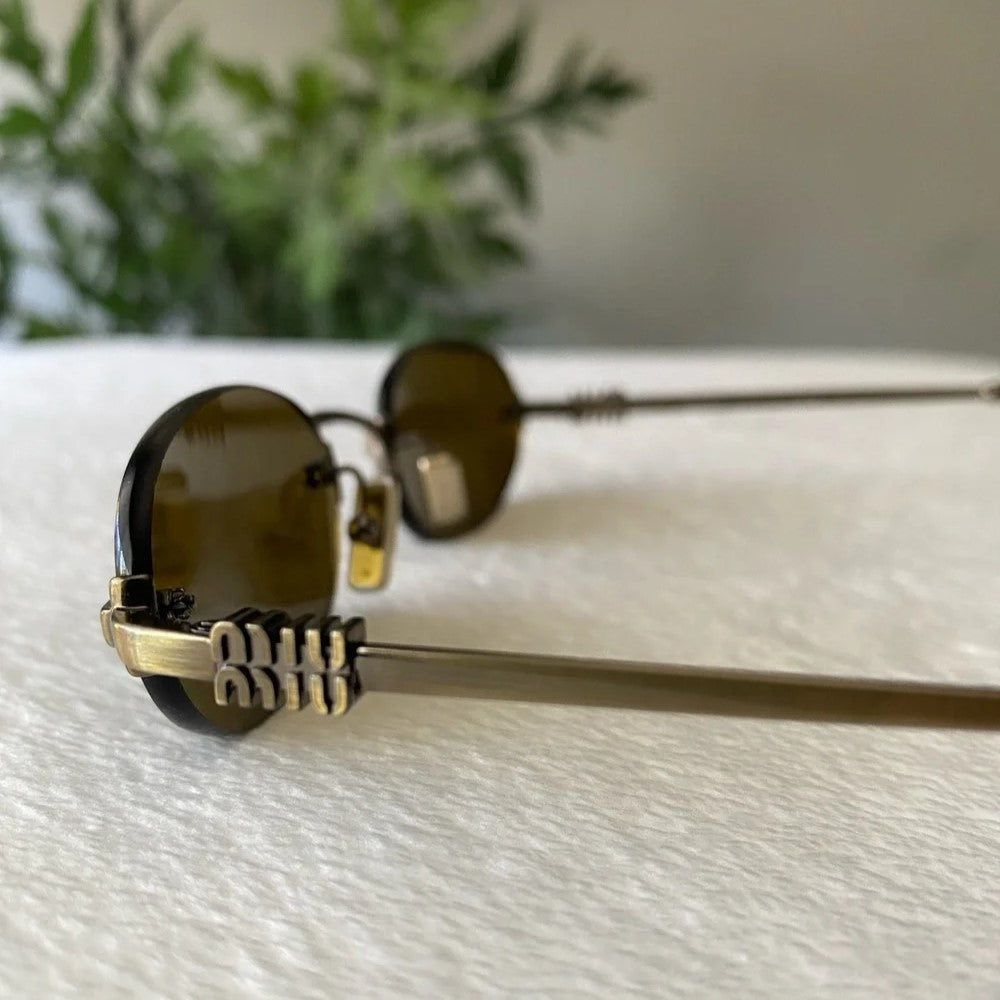 Lentes de Sol Miu Miu MU A54S